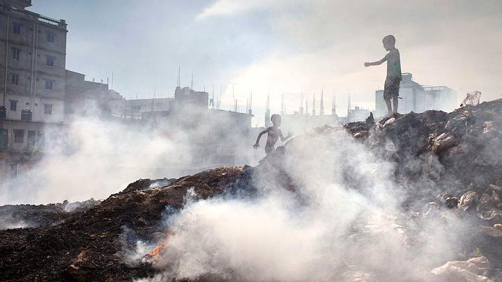Smoke rising from open waste burning, photographed for the Peltier Aerosol Lab
